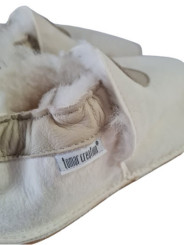 Petite gomme en peau lainée blanche choix du décors