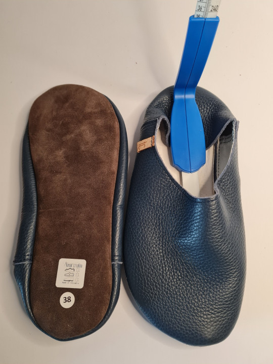Babouche slippers are organic and blue in color