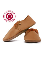 Soft bio leather slippers with lace-up closure for a perfect fit.