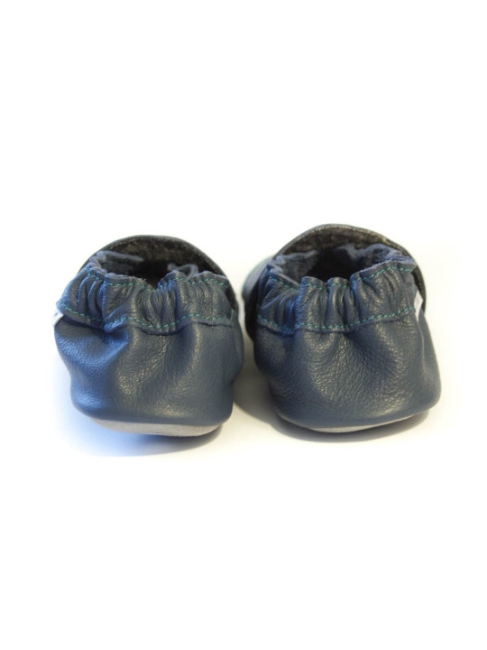 Pois pastels sur fond bleu chaussons souples en cuir