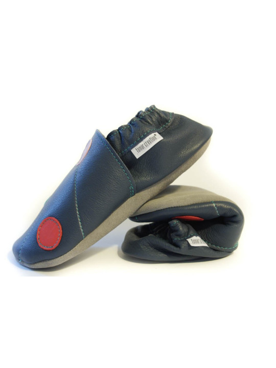 Pois pastels sur fond bleu chaussons souples en cuir